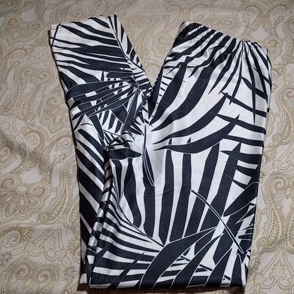 lotus leggings same manufacturer Pants - New black and white leaves or jungle leggings